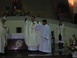 Father Facundo blesses Cardinal Bergoglio